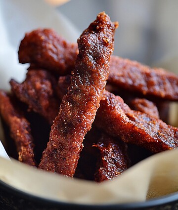 Gourmet Idaho finger steaks in a bowl, perfect crispy protein snack for fair lovers.