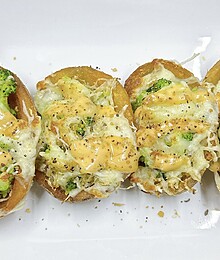 Delicious cheesy broccoli stuffed potatoes, baked to perfection for a comforting, healthy meal.